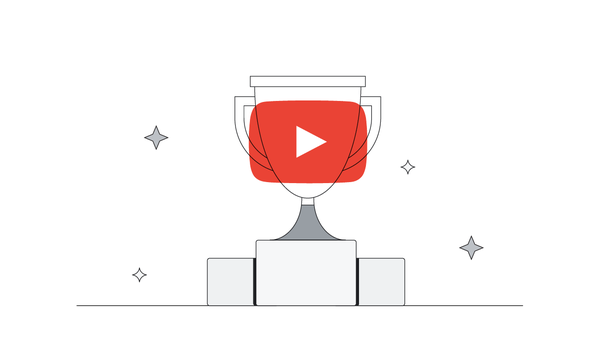 A trophy featuring the YouTube Play button logo sits on the top tier of a three-tiered podium surrounded by stars to celebrate the YouTube Works Awards.